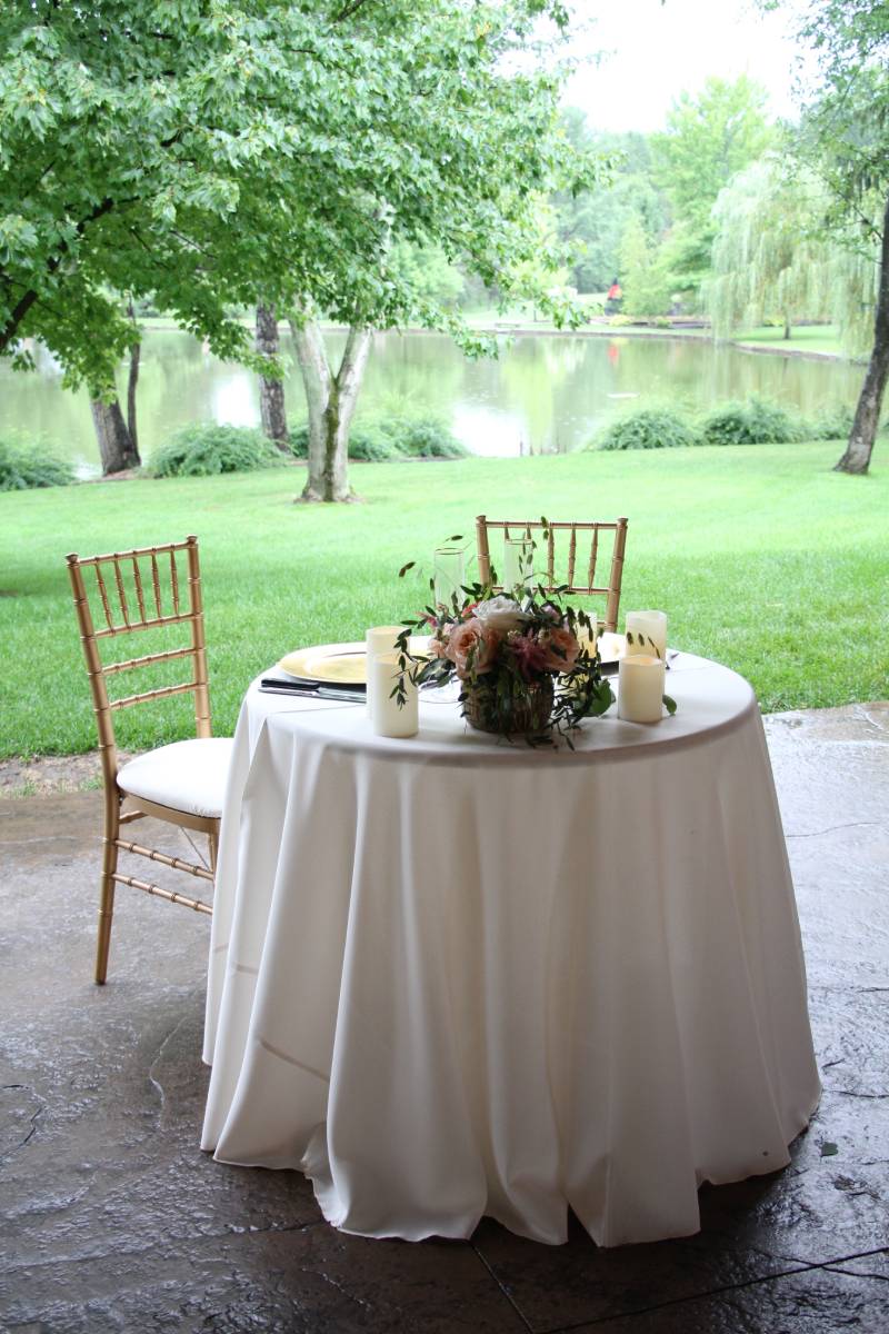Table 36" Round Wood Topped With 96" Round Ivory Solid Tablecover With Gold Wooden Chiavari Chairs